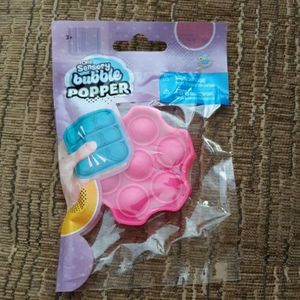 #675NWT Sensory bubble mini popper. Pink Octagon.